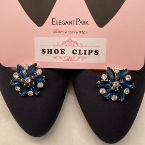 White and blue crystal shoe clips.